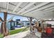 Covered patio overlooking the water, with furniture at 353 144Th Ave, Madeira Beach, FL 33708
