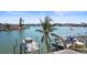 Scenic waterfront view with boats docked at private piers at 353 144Th Ave, Madeira Beach, FL 33708
