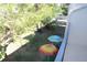 View from balcony showing a grassy backyard area at 4215 E Bay Dr # 1202C, Clearwater, FL 33764