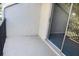 Private balcony with sliding glass doors and metal railing at 4215 E Bay Dr # 1202C, Clearwater, FL 33764