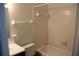 Simple bathroom with tiled walls, a bathtub, and sink at 4215 E Bay Dr # 1202C, Clearwater, FL 33764