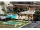 Aerial view of community with pool, shuffleboard, and parking at 5020 Brittany S Dr # 213, St Petersburg, FL 33715