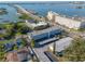 Aerial view highlighting the condo building's location and surrounding area at 55 Harbor View Ln # 301, Belleair Bluffs, FL 33770