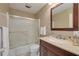 Clean bathroom with a tub, vanity, and mirror at 55 Harbor View Ln # 301, Belleair Bluffs, FL 33770