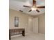 Small bedroom with a desk and access to a hallway at 55 Harbor View Ln # 301, Belleair Bluffs, FL 33770
