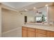 Kitchen with pass-through to dining area, offering an open concept floor plan at 55 Harbor View Ln # 301, Belleair Bluffs, FL 33770