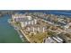 Stunning aerial view of the condo community nestled on the waterfront, complete with boat docks at 650 Island Way # 106, Clearwater Beach, FL 33767