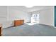 Cozy bedroom with ample natural light and carpeted floors at 650 Island Way # 106, Clearwater Beach, FL 33767