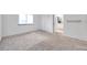 Bedroom with carpet and kitchen access at 650 Island Way # 106, Clearwater Beach, FL 33767