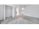 Carpeted bedroom with a closet and an ensuite bathroom at 650 Island Way # 106, Clearwater Beach, FL 33767