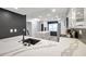 Bright kitchen features sleek quartz countertops, stylish backsplash, and stainless steel appliances at 650 Island Way # 106, Clearwater Beach, FL 33767