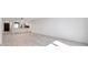 Inviting living area with light-filled ambiance and open access to the modern kitchen at 650 Island Way # 106, Clearwater Beach, FL 33767