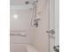 Close up of a shower with white tile at 650 Island Way # 106, Clearwater Beach, FL 33767