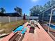 Backyard area with a pool, patio furniture, and lawn at 712 Gateway Ln, Tampa, FL 33613