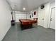 Converted garage game room with pool table at 712 Gateway Ln, Tampa, FL 33613