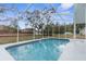 Sparkling screened-in pool ideal for summer fun at 10300 Gifford Dr, Spring Hill, FL 34608