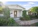 House exterior with landscaping and walkway at 141 Miramar Ne Blvd, St Petersburg, FL 33704