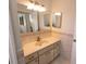 Bathroom features a vanity with a vessel sink and tiled walls at 1506 Bentwood Dr, Sun City Center, FL 33573