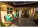 Charming patio with inviting views, tiled floors, and comfortable seating, seamlessly connecting indoor and outdoor spaces at 1506 Bentwood Dr, Sun City Center, FL 33573