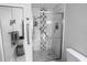 Modern shower with geometric tile design at 1506 Bentwood Dr, Sun City Center, FL 33573