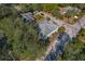 Aerial view of the home and surrounding area at 1509 E Tessier Dr, Tarpon Springs, FL 34689