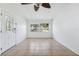 Living room with tile floors and large windows at 1514 Nelson Ave, Clearwater, FL 33755