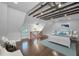 Spacious bedroom featuring exposed beams and hardwood floors at 1535 Manor S Way, St Petersburg, FL 33705