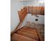 Wine cellar with wooden racks, brick accents, and tiled floor at 1535 Manor S Way, St Petersburg, FL 33705