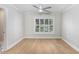 Bright bedroom with hardwood floors and plantation shutters at 16407 Zurraquin De Avila, Tampa, FL 33613