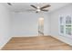 Light and bright bedroom with hardwood floors and access to bathroom at 16407 Zurraquin De Avila, Tampa, FL 33613