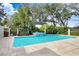 Refreshing pool with a spa and lush landscaping at 16407 Zurraquin De Avila, Tampa, FL 33613