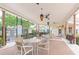 Covered patio with tables and chairs, perfect for relaxing outdoors at 1660 S Lake Ave # 1, Clearwater, FL 33756
