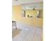 Dining room with tiled floor and large mirror at 1660 S Lake Ave # 1, Clearwater, FL 33756