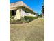 Building exterior showcasing landscaping and lawn at 1660 S Lake Ave # 1, Clearwater, FL 33756