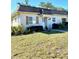 Charming single-story home with a well-maintained lawn and landscaping at 1660 S Lake Ave # 1, Clearwater, FL 33756