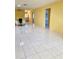 Living room with tiled floor and access to other rooms at 1660 S Lake Ave # 1, Clearwater, FL 33756