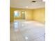 Living area with tile floors and access to exterior at 1660 S Lake Ave # 1, Clearwater, FL 33756