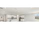 Bright and airy kitchen featuring modern appliances and white cabinets at 17901 Solstice Ave, Venice, FL 34293