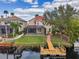 Backyard oasis featuring a private pool and dock on a canal at 18014 Cozumel Isle Dr, Tampa, FL 33647