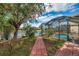Brick-paved pathway to a private dock on the canal at 18014 Cozumel Isle Dr, Tampa, FL 33647