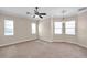 Bright and airy bedroom with a ceiling fan and neutral-toned carpet at 18014 Cozumel Isle Dr, Tampa, FL 33647