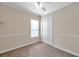 Bright bedroom with carpet, double closet, and ceiling fan at 18014 Cozumel Isle Dr, Tampa, FL 33647