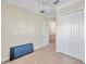 Versatile bedroom with double door closet and neutral decor at 18014 Cozumel Isle Dr, Tampa, FL 33647