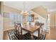 Elegant dining room with hardwood floors and chandelier at 18014 Cozumel Isle Dr, Tampa, FL 33647
