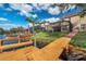 Private dock with seating area, offering scenic waterfront views at 18014 Cozumel Isle Dr, Tampa, FL 33647
