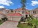 Beautiful two-story house with tile roof and two-car garage at 18014 Cozumel Isle Dr, Tampa, FL 33647
