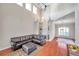 Spacious living room with hardwood floors and sectional sofa at 18014 Cozumel Isle Dr, Tampa, FL 33647