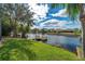 Serene waterfront view with private dock access at 18014 Cozumel Isle Dr, Tampa, FL 33647