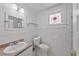 Charming bathroom with subway tile and pedestal sink at 2110 W Southview Ave, Tampa, FL 33606