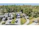 Townhouse community nestled in a wooded area with ample parking at 215 Woods Landing Trl, Oldsmar, FL 34677